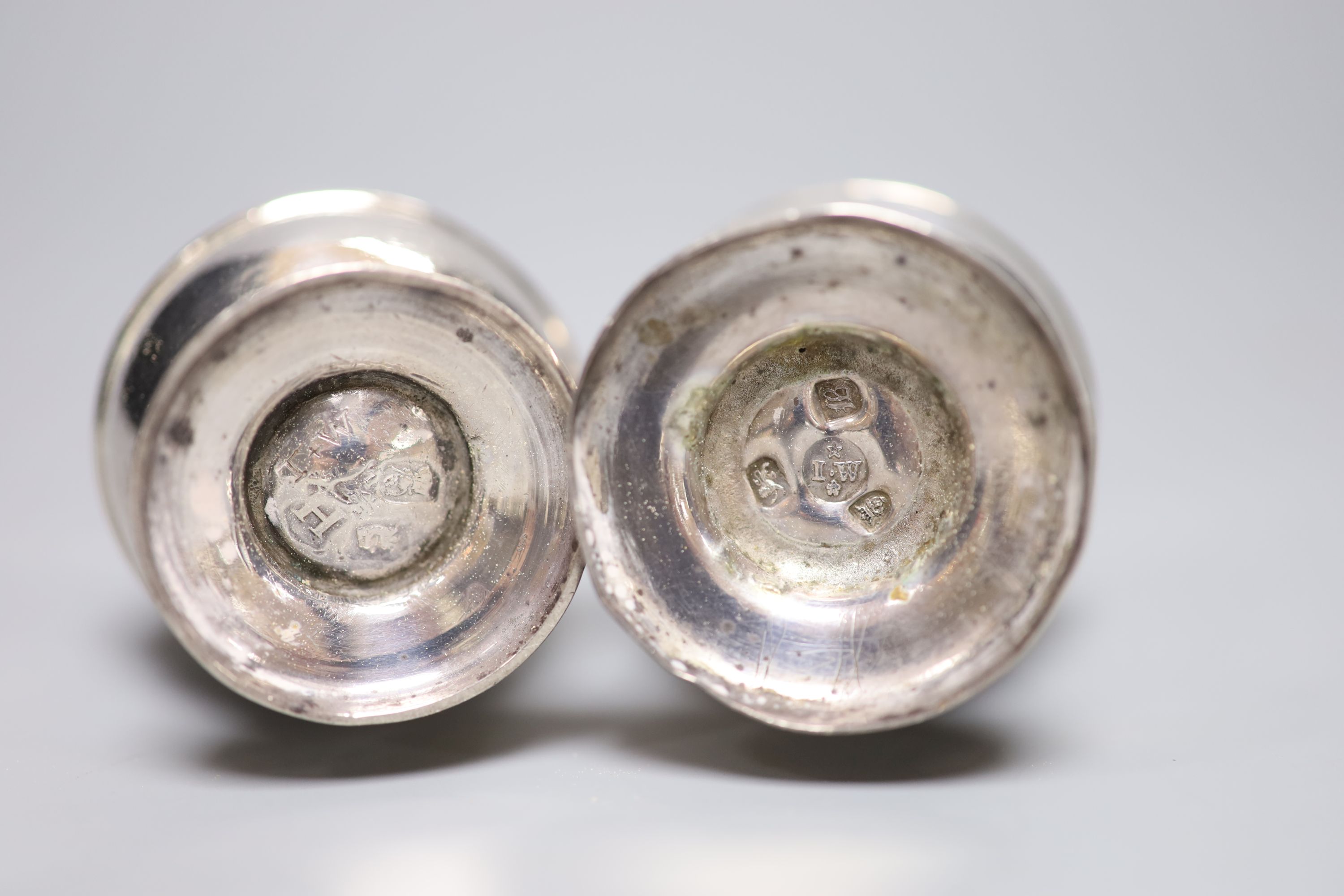 Two 18th century silver peppers, London, 1723 and London, 1757, the latter a.f.